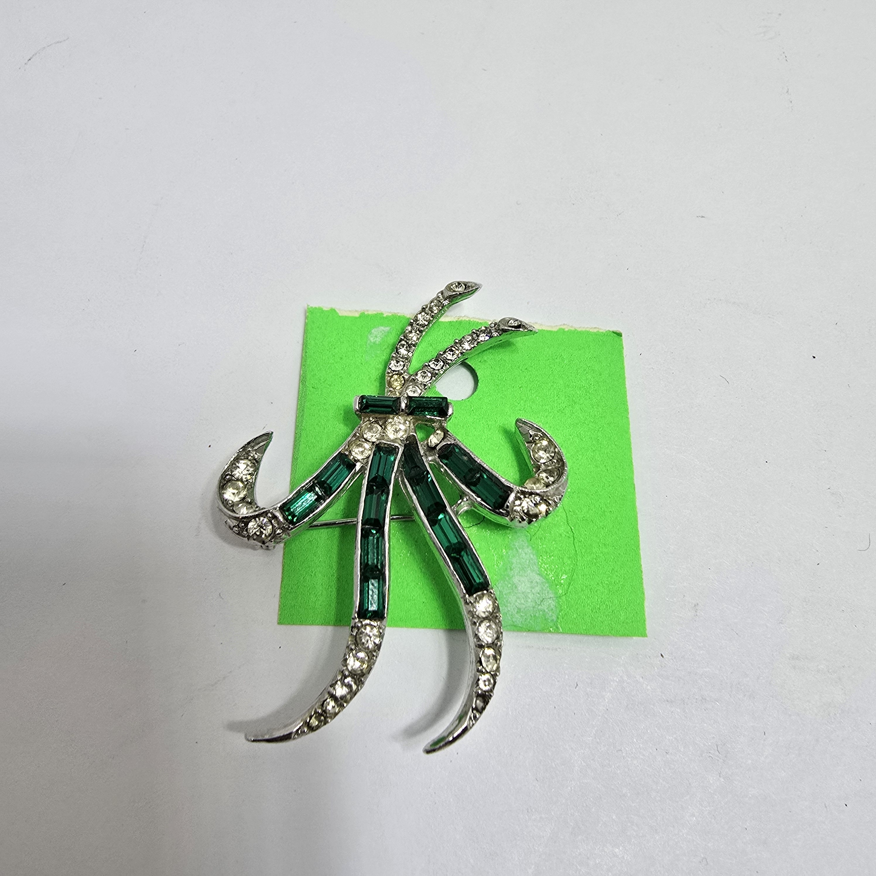 Stylish Silver And Green Crystal Brooch